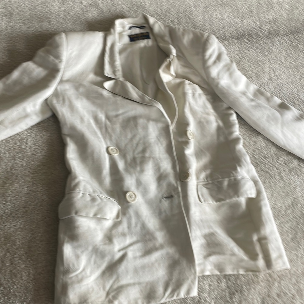 Slightly worn cream linen jacket
